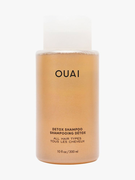 Ouai The Detox Shampoo bottle of amber shampoo on light gray background