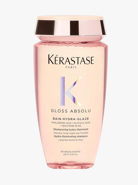 Kérastase Gloss Absolu Shampoo in branded component on a light gray background