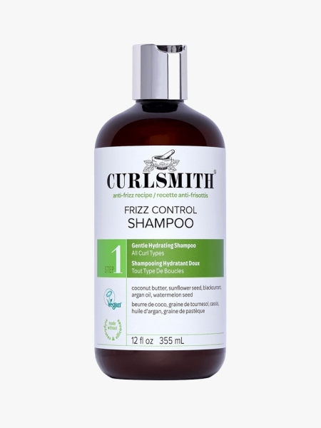 Curlsmith Frizz Control Shampoo in branded component on a light gray background